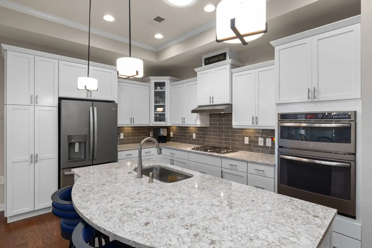 A bright residential kitchen with cabinets and counters. Boca Raton.